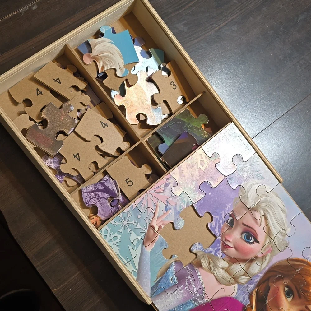 5 Disney Frozen Puzzles in Wooden Storage Bin